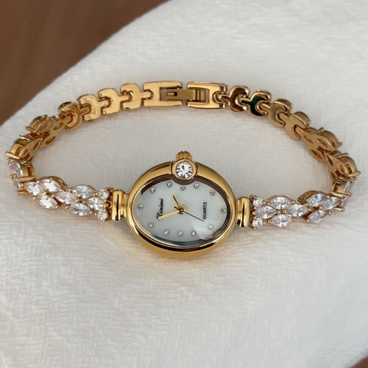 Classic Oval White Dial Golden Watch with Sparkling Two Tone Alloy Bracelet Quartz Movement