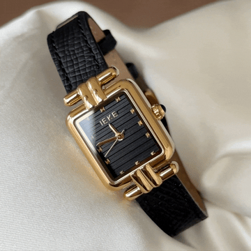 Noir Élégance – Women’s Black Leather Strap Watch with Gold Rectangular Case and Black Dial