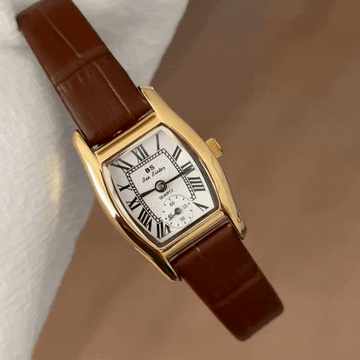 Elegant Barrel White Dial Gold Watch with Brown Leather Strap and Quartz