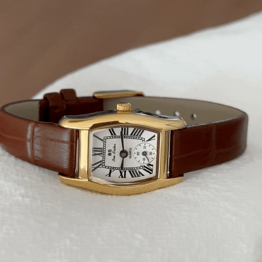 Elegant Barrel White Dial Gold Watch with Brown Leather Strap and Quartz