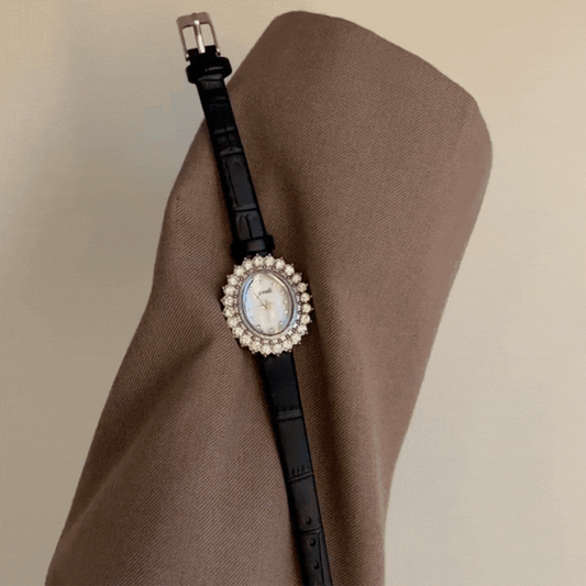 Soléa Vintage – Women’s Oval Mother-of-Pearl Watch with Sunburst Crystal Bezel & Black Leather Strap