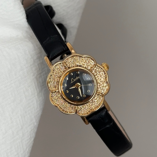 Sophisticated Floral Black Dial Watch with Gold Case & Leather Strap