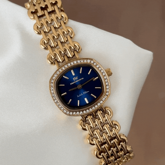 Affordable Luxury Blue Oval Watch - Gold Diamond Bezel & Alloy Bracelet