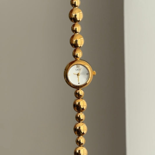 Contemporary Silver Timepiece - Gold Round & Beaded Strap
