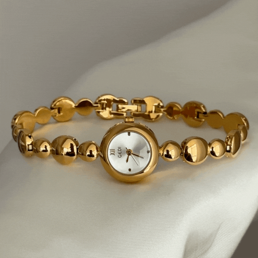 Contemporary Silver Timepiece - Gold Round & Beaded Strap
