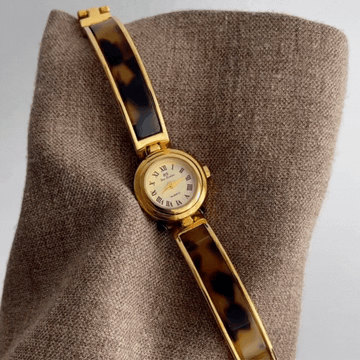 Reloj Amber Circle: reloj de brazalete de cuarzo vintage