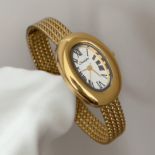 Sophistication Elegant: White Oval Dial Watch with Gold Wheat Pattern Stainless Steel Bracelet