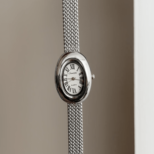 Natural Elegance: White Oval Dial Watch with Silver Wheat Pattern Stainless Steel Bracelet