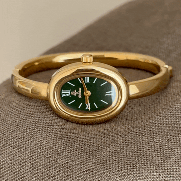 Emerald Éclat – Women’s Gold Bangle Quartz Watch with Green Tonneau Dial