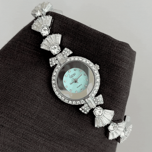 Feminine Chic: Green Round Dial with Diamond Silver Bezel & Diamond Bow Strap