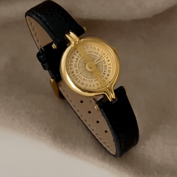 Reloj de cuarzo de cuero dorado de medianoche: reloj negro y dorado