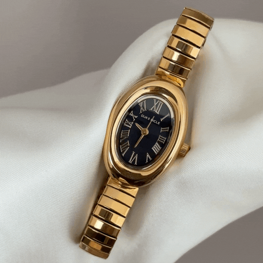 Gold Stretch Bracelet Women’s Quartz Watch – Mini Black Oval Dial