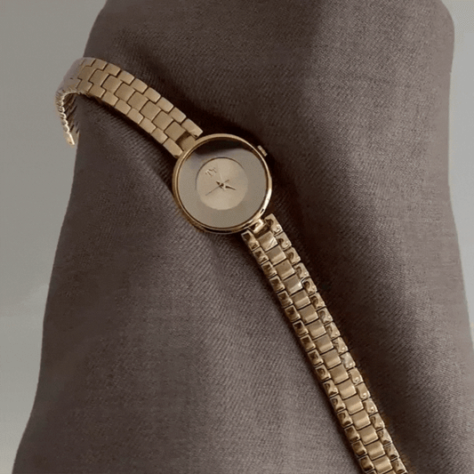 Orologio a specchio dorato: orologio minimalista di lusso