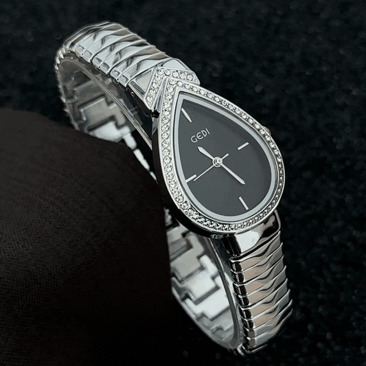Bold Artistry: Black Teardrop Serpent-Head Dial with Silver Diamond Bezel & Strap