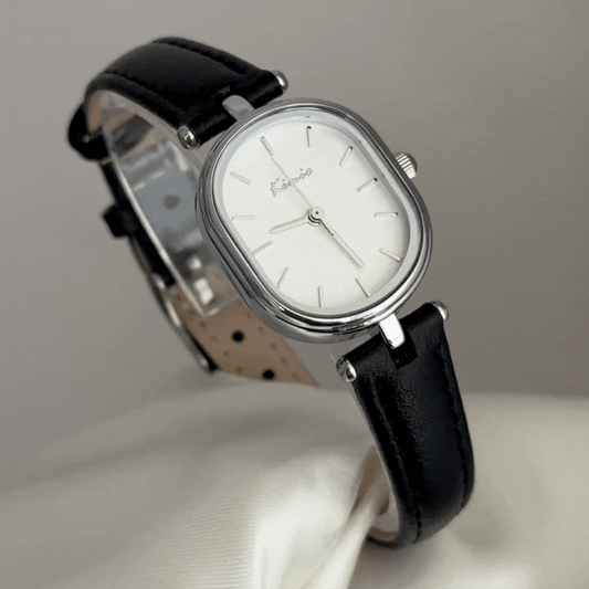 Modern Classic: White Oval Dial with Silver Accents & Black Leather Strap