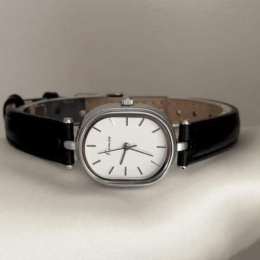 Modern Classic: White Oval Dial with Silver Accents & Black Leather Strap