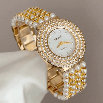 Feminine Opulence: White Round Dial with Pearl-Inlaid Gold Diamond Bracelet