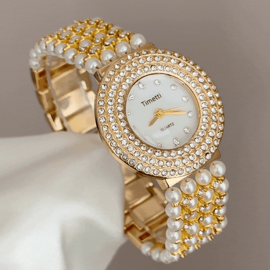 Feminine Opulence: White Round Dial with Pearl-Inlaid Gold Diamond Bracelet