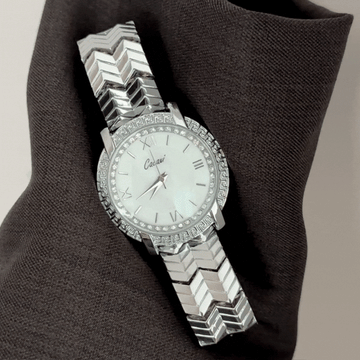 Refined Sparkle: White Diamond Dial with All-Silver Strap