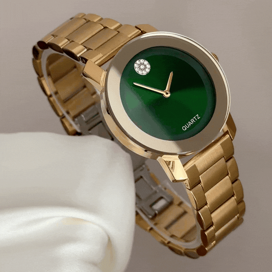 Sophisticated Elegance: A Green Round Dial and Its Full Gold-Tone Bracelet