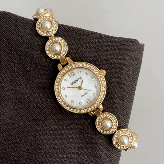 Feminine Grandeur: Defined by Opulence – White Round Dial with Pearl & Diamond Gold Accents
