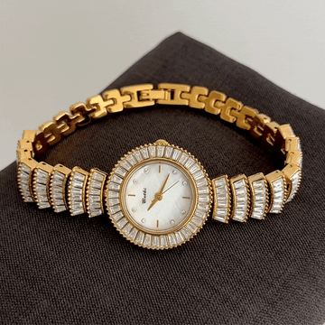 Feminine Glamour: White Round Dial with Fully Diamond-Set Gold Bracelet