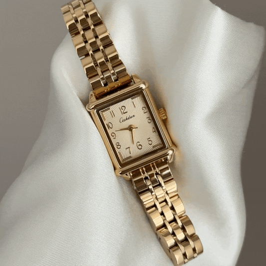 Monochrome Elegance: Gold Square Dial Watch with Gold-Tone Bracelet