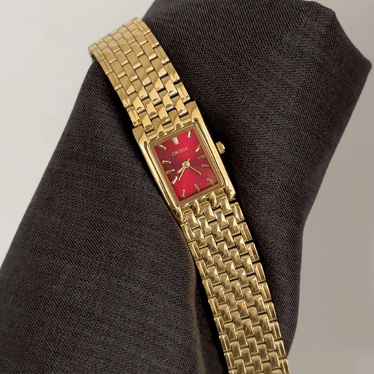 A Bold Red Rectangle: Gold-Accented Stainless Steel Bracelet Watch