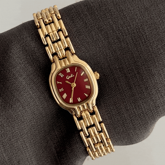 Passionate Elegance: Red Round Dial Watch with Gold Bezel & Gold Alloy Strap