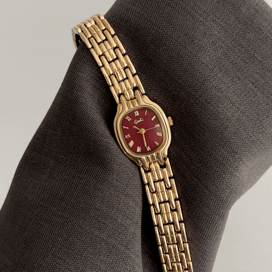 Passionate Elegance: Red Round Dial Watch with Gold Bezel & Gold Alloy Strap