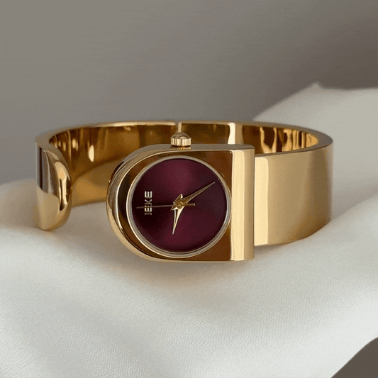 Versatile Statement: Vivid Red Round Dial Watch with Gold Cuff Bracelet