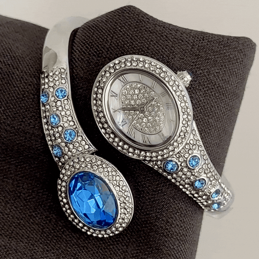 Serpentine Edge: Silver Oval Diamond Dial with Blue Diamond Serpent Bracelet