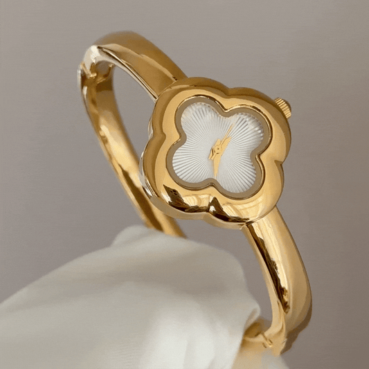 Feminine Elegance: White Clover-Shaped Dial with Gold Clover Bezel & Gold-Tone Bracelet