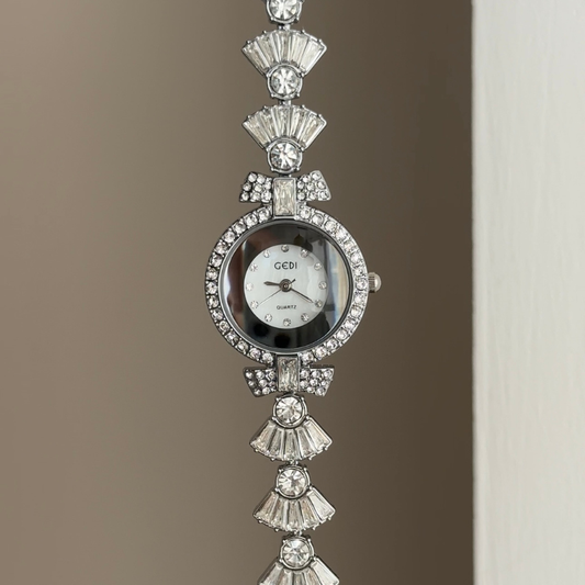 Feminine Glamour: White Round Dial with Diamond-Set Silver Bezel & Diamond Bow Strap