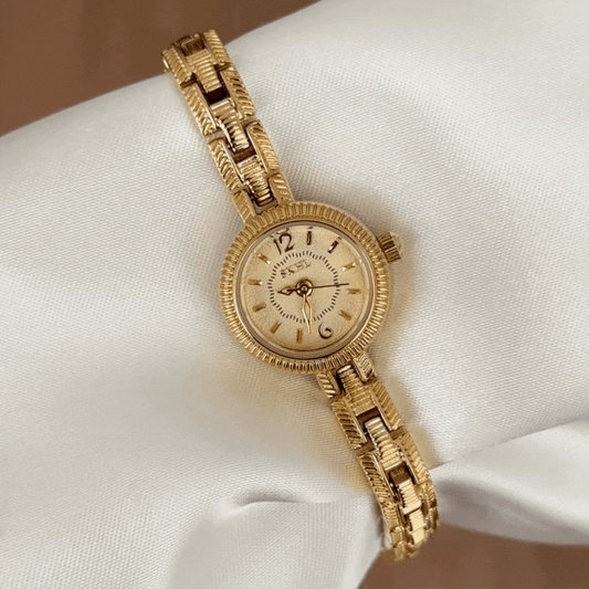 Women's Minimalist Gold Round Dial with Embossed Alloy Strap - Quartz