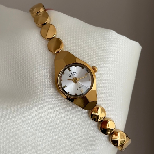 Metropolitan White Round Dial Watch – Gold Bezel & Gold Alloy Bracelet Quartz