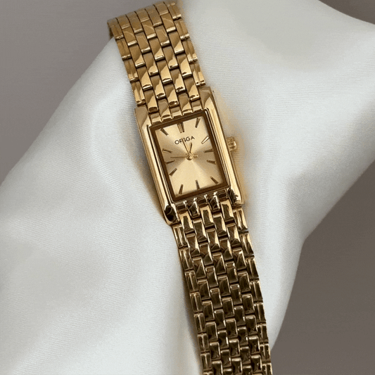 Monochrome Luxury: Gold Rectangle Dial with Full Gold-Tone Bracelet