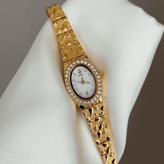 Gilded Grace: White Oval Dial Watch with Gold Diamond Bezel & Alloy Bracelet