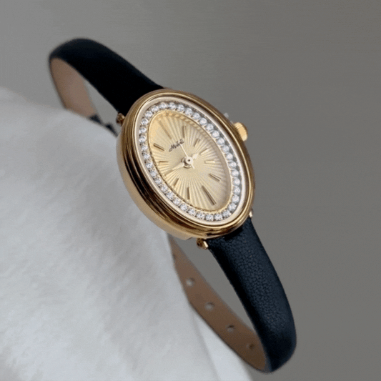 Luna Éclat – Women’s Gold Crystal Oval Dial Quartz Watch with Black Leather Strap