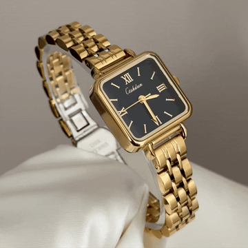 Defining Executive Chic: A Black Rectangle Dial Paired with a Gold-Tone Bracelet