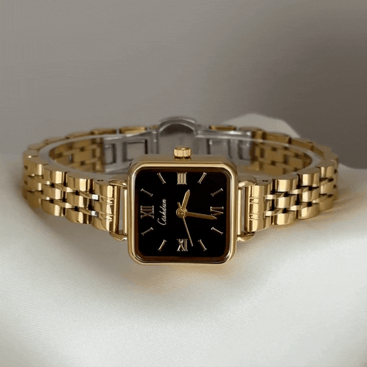 Defining Executive Chic: A Black Rectangle Dial Paired with a Gold-Tone Bracelet