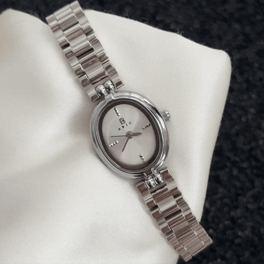Elegant Silver Oval Dial Watch – Silver Bezel & Silver Stainless Steel Bracelet Quartz