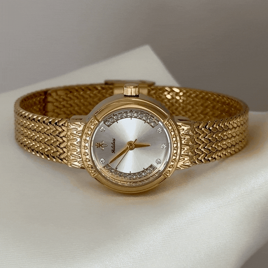 Textural Luxury : White Round Dial Watch with Gold Wheat Pattern Stainless Steel Bracelet