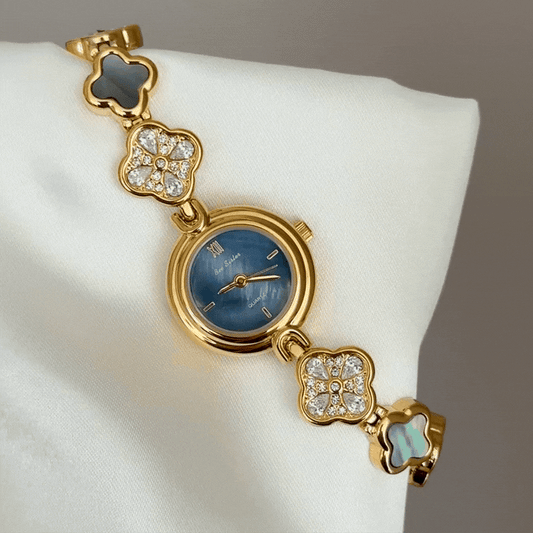 Feminine Delicate: Luminous Mother-of-Pearl & Lucky Clover Bracelet Watch