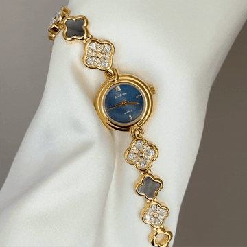 Feminine Delicate: Luminous Mother-of-Pearl & Lucky Clover Bracelet Watch