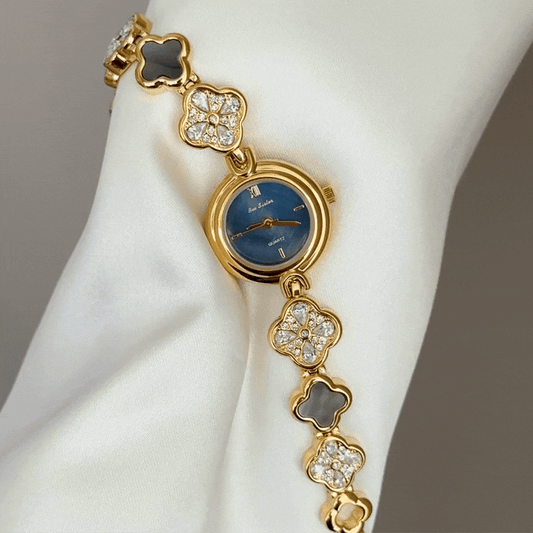 Feminine Delicate: Luminous Mother-of-Pearl & Lucky Clover Bracelet Watch