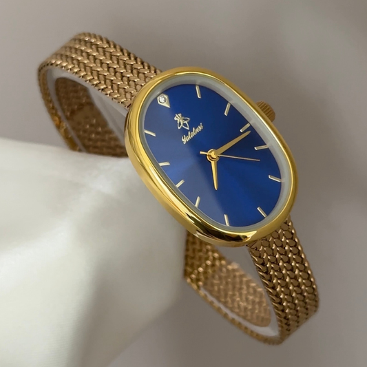 Warm Sophistication: Navy Oval Dial Watch with Gold Oval Bezel & Gold Wheat Pattern Bracelet