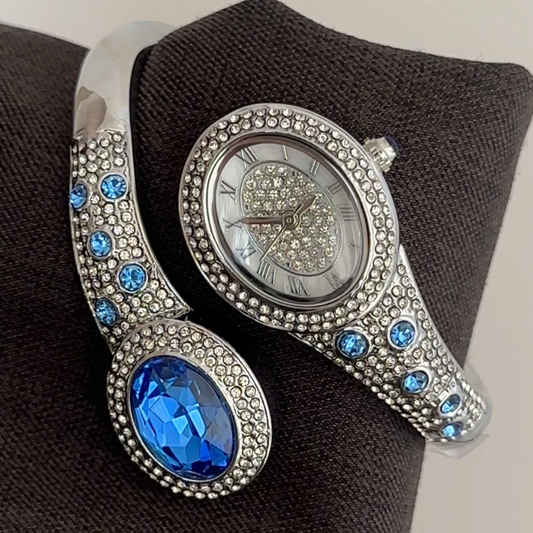 Serpentine Edge: Silver Oval Diamond Dial with Blue Diamond Serpent Bracelet