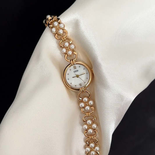Radiant Brilliance White Oval Mother-of-Pearl Dial Gold Diamond Watch