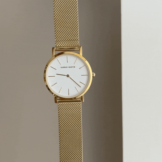 Timeless Classic Elegant: White Round Dial Watch with Gold Stainless Steel Bracelet